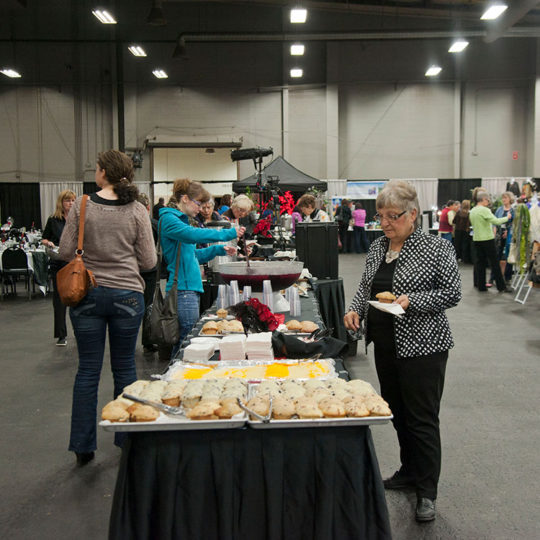 banquethall003750x750 Camrose Regional Exhibition People standing in the Event Centre getting food in line